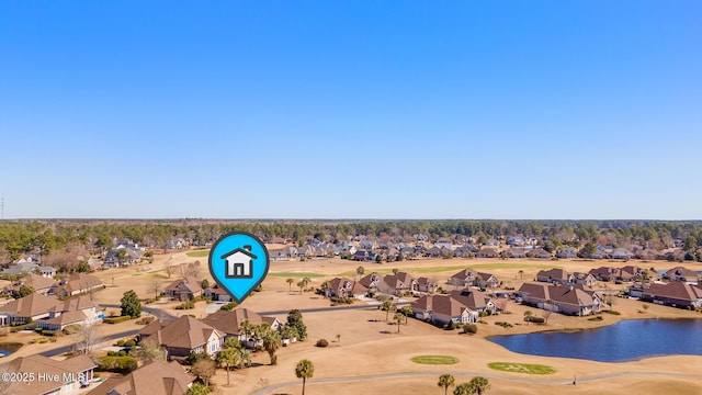 bird's eye view with a residential view and a water view