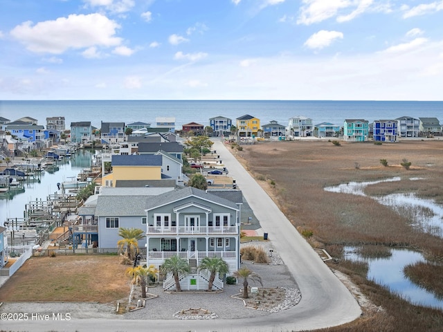 drone / aerial view featuring a water view