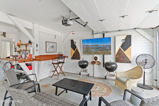 interior space with concrete flooring and a garage