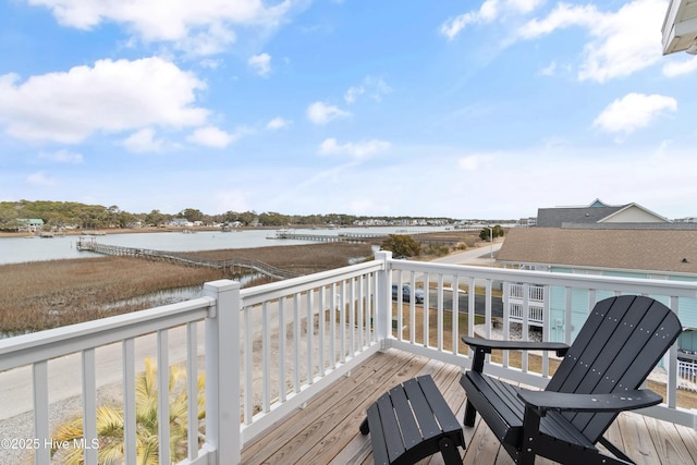 deck featuring a water view