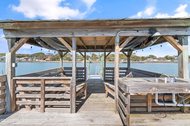 view of dock with a water view