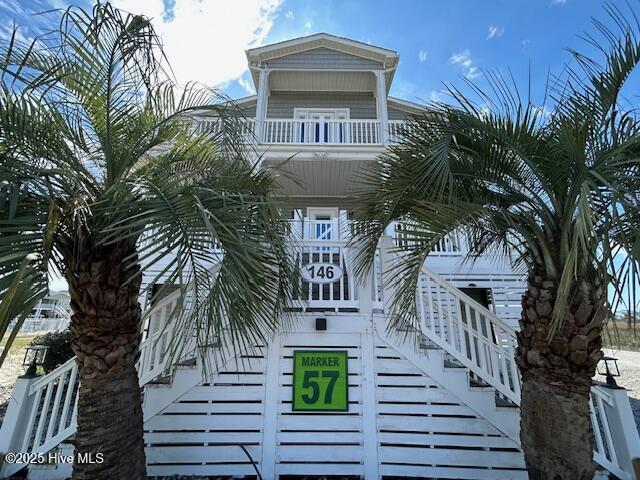 view of building exterior with stairs