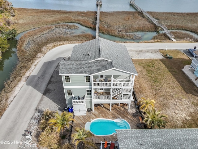 aerial view featuring a water view