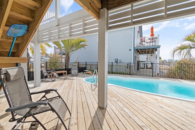 view of pool featuring fence, a deck, and a fenced in pool