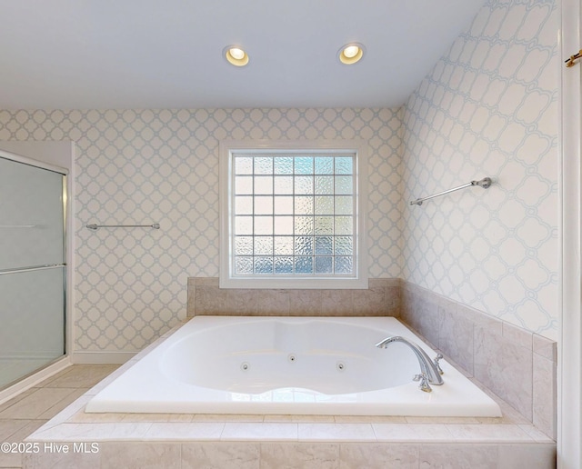 bathroom with recessed lighting, a whirlpool tub, and wallpapered walls