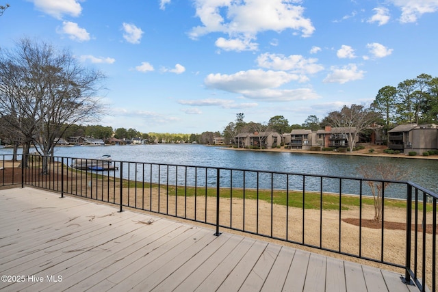 wooden terrace with a water view