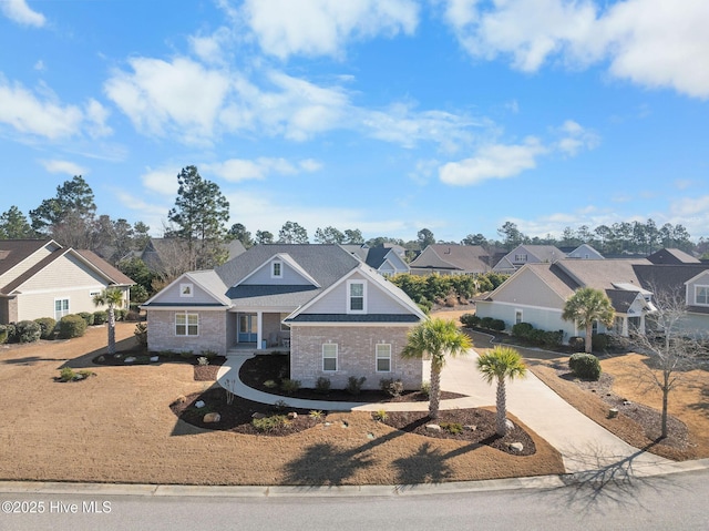 view of front facade with driveway and a residential view