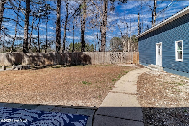 view of yard with fence