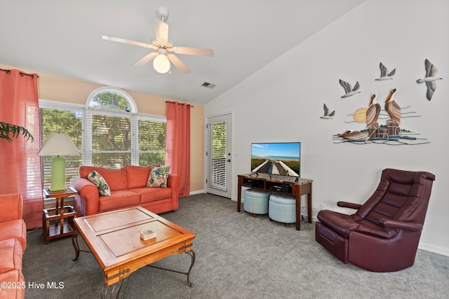 carpeted living area with vaulted ceiling, baseboards, visible vents, and a ceiling fan