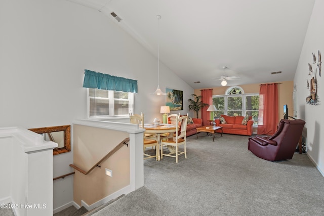 living room with high vaulted ceiling, carpet, visible vents, and ceiling fan