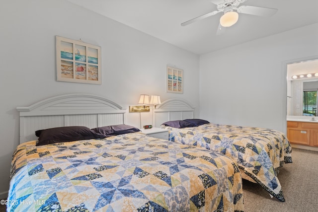 carpeted bedroom featuring ceiling fan and connected bathroom