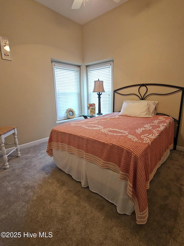 bedroom with baseboards, carpet, and ceiling fan