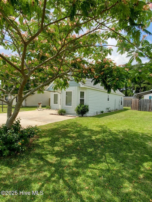 view of yard featuring fence