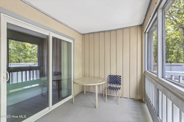 unfurnished sunroom with a wealth of natural light