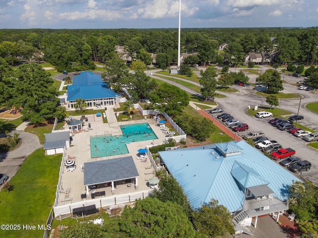 aerial view featuring a view of trees