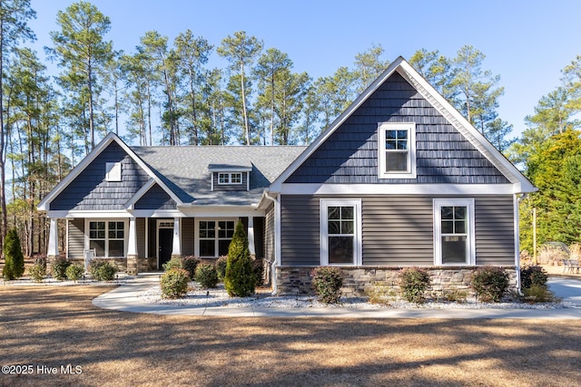 craftsman inspired home with stone siding