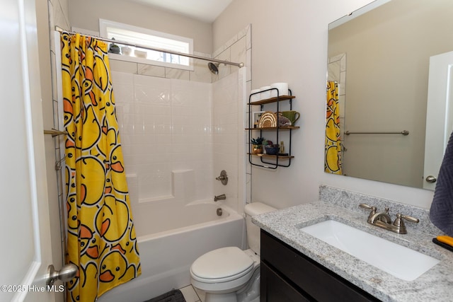 bathroom featuring shower / tub combo with curtain, vanity, and toilet