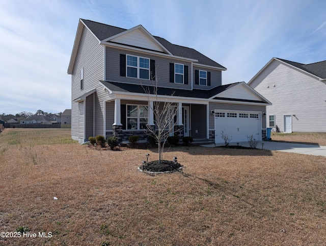 craftsman-style house with covered porch, an attached garage, and concrete driveway