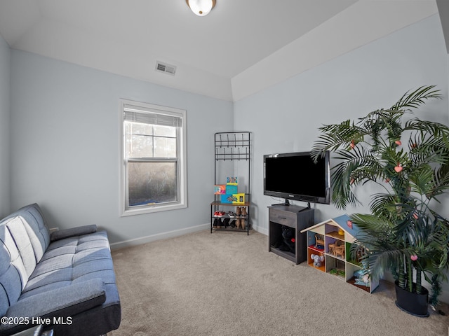 living room featuring visible vents, baseboards, and carpet