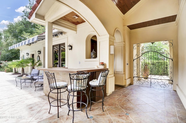 view of patio / terrace with an outdoor bar