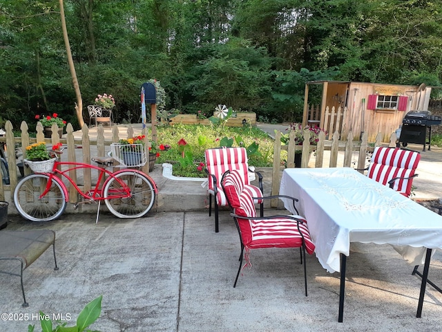 view of patio / terrace featuring a grill and outdoor dining area