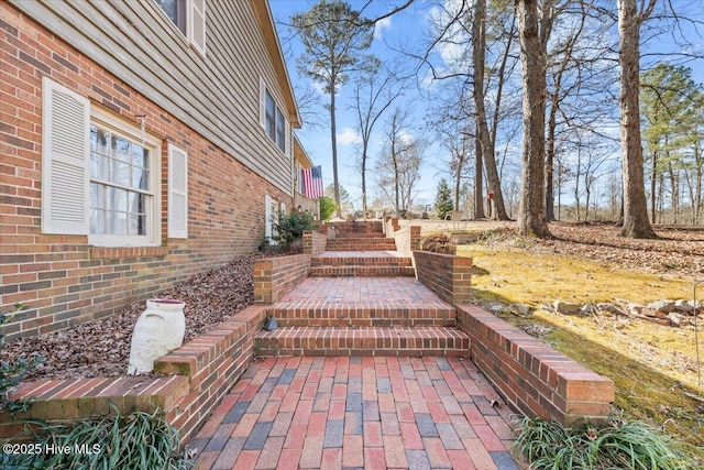 view of patio / terrace with stairway