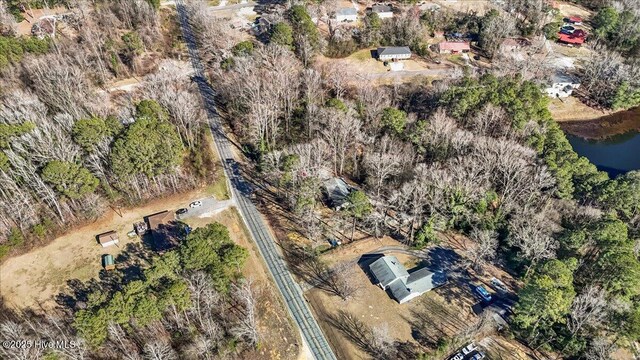 view of property exterior with a yard