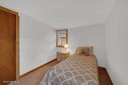 bedroom featuring baseboards