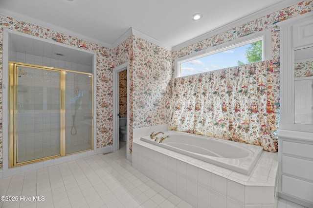 bathroom with a garden tub, crown molding, toilet, a stall shower, and tile patterned flooring