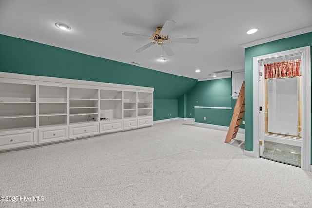 unfurnished living room with visible vents, a ceiling fan, vaulted ceiling, carpet floors, and recessed lighting