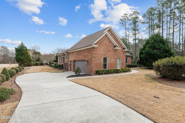 view of front facade with driveway, a garage, roof with shingles, a front lawn, and brick siding