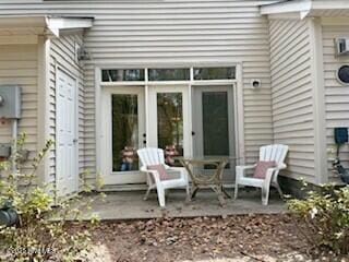 view of patio featuring french doors