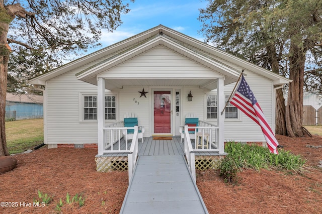 bungalow-style house featuring crawl space and a porch