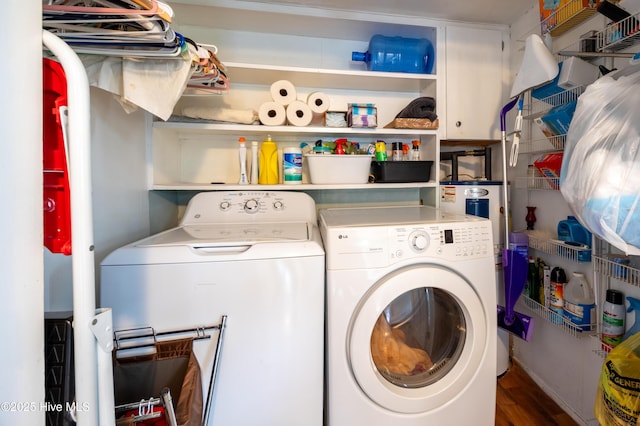 washroom with laundry area, independent washer and dryer, and wood finished floors