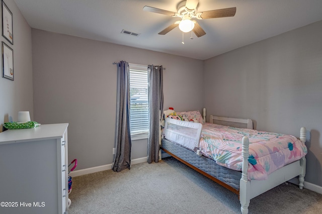 bedroom with a ceiling fan, light colored carpet, visible vents, and baseboards