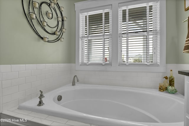 full bath featuring a garden tub