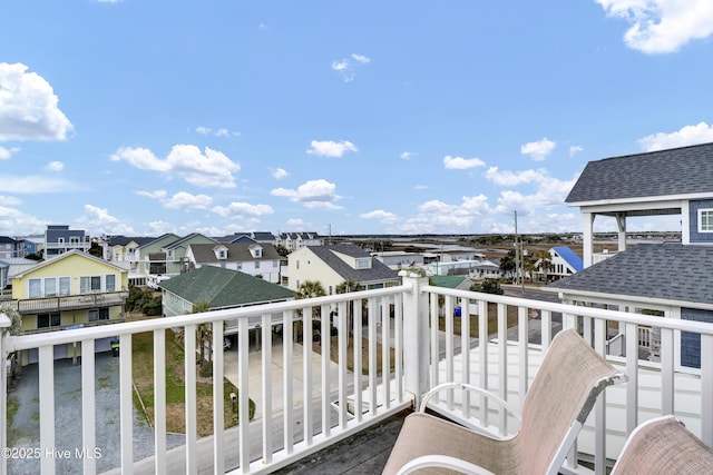 balcony featuring a residential view