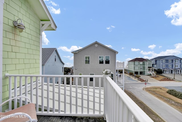 balcony featuring a residential view