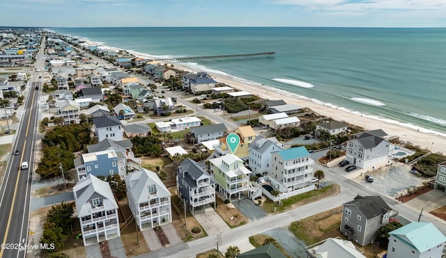 bird's eye view with a beach view and a water view