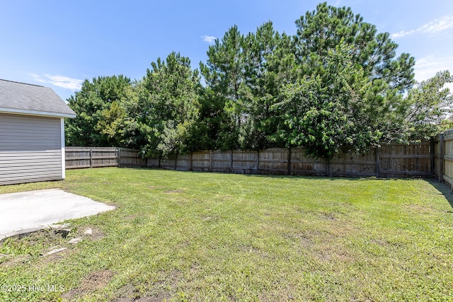 4000 W T Whitehead Dr, Jacksonville, NC 28546 - fenced backyard featuring a patio area