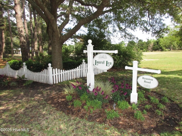 7907 Reunion Rd, Wilmington, NC 28411 - community / neighborhood sign featuring a lawn and fence