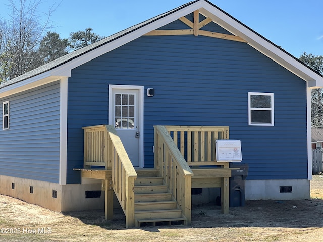 back of property with crawl space