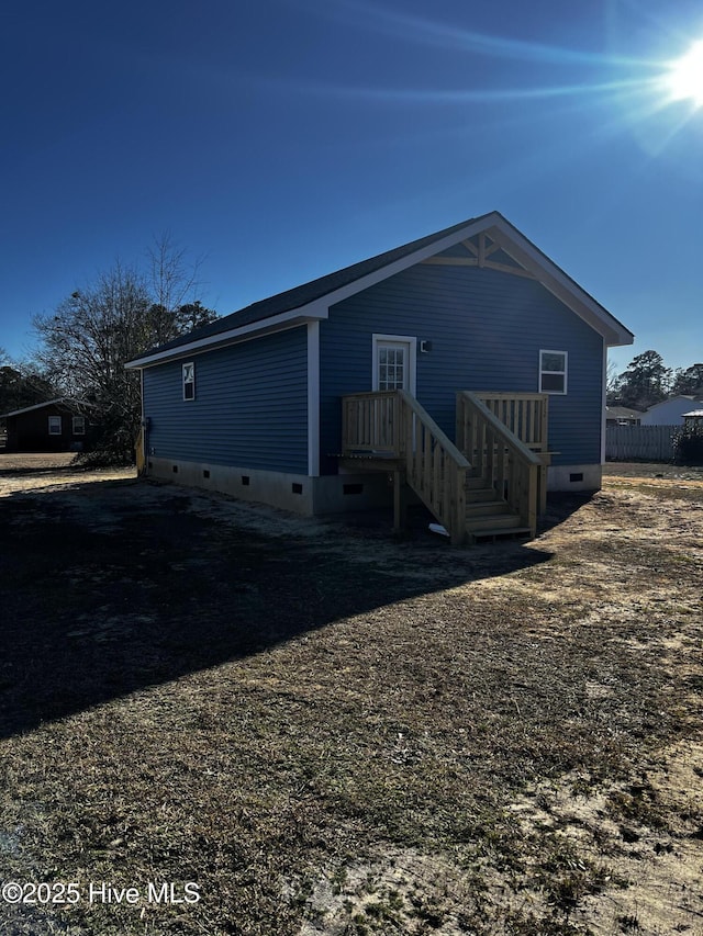 view of front of house featuring crawl space