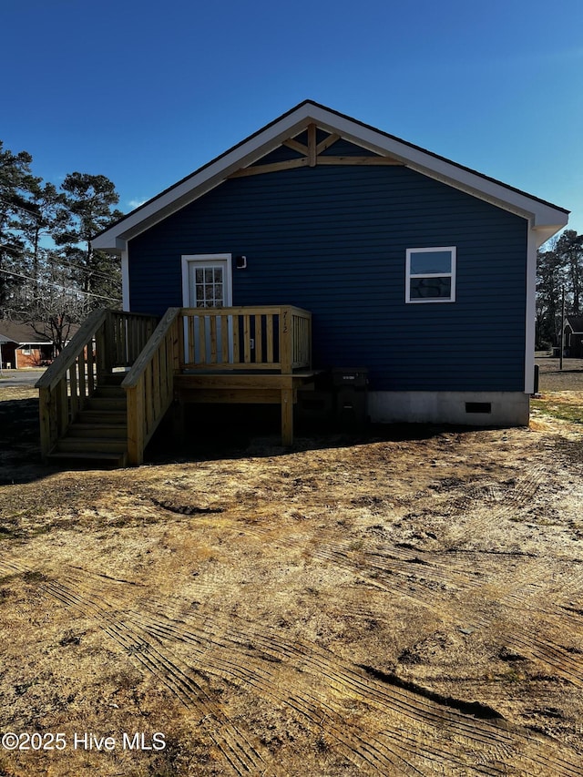 view of front of house with crawl space