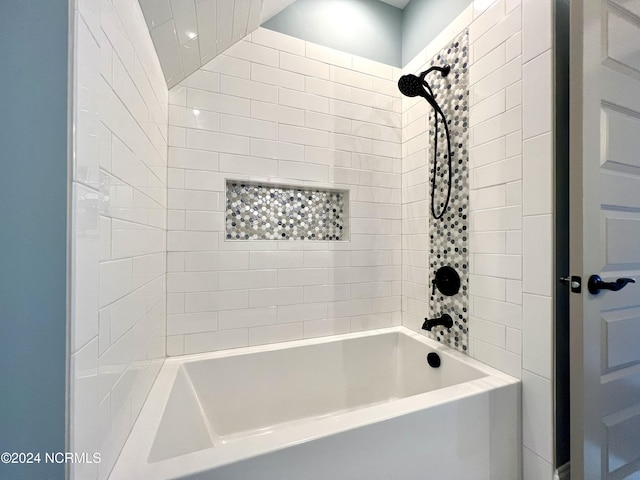 bathroom featuring  shower combination