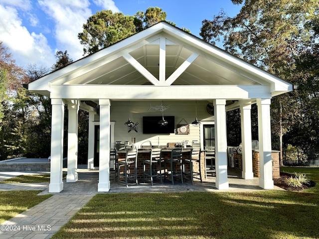 view of patio with outdoor dry bar