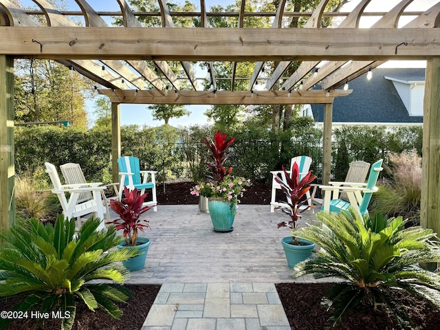 view of patio featuring a pergola