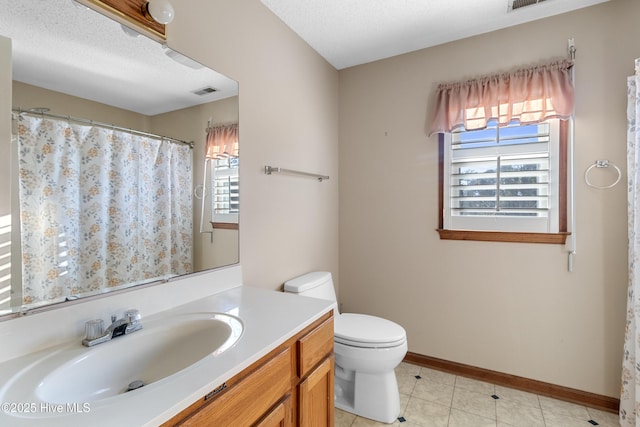 full bath featuring toilet, baseboards, a textured ceiling, and vanity