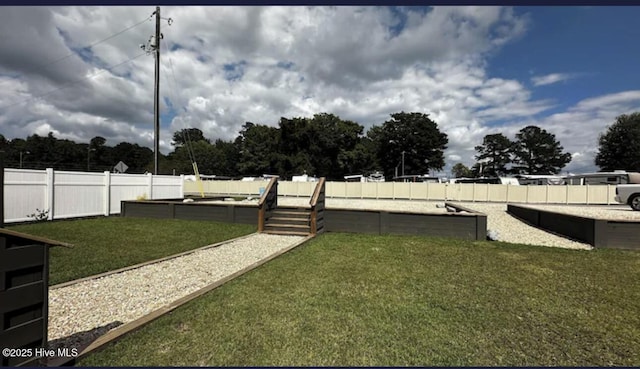 view of yard featuring fence