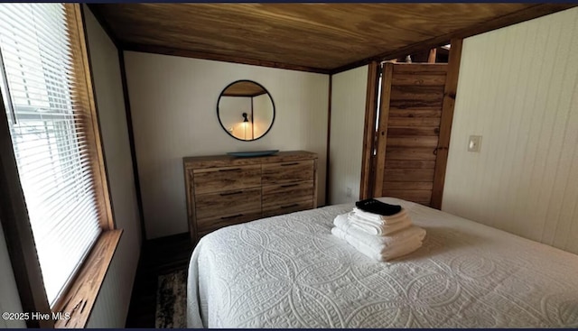 bedroom featuring wood ceiling